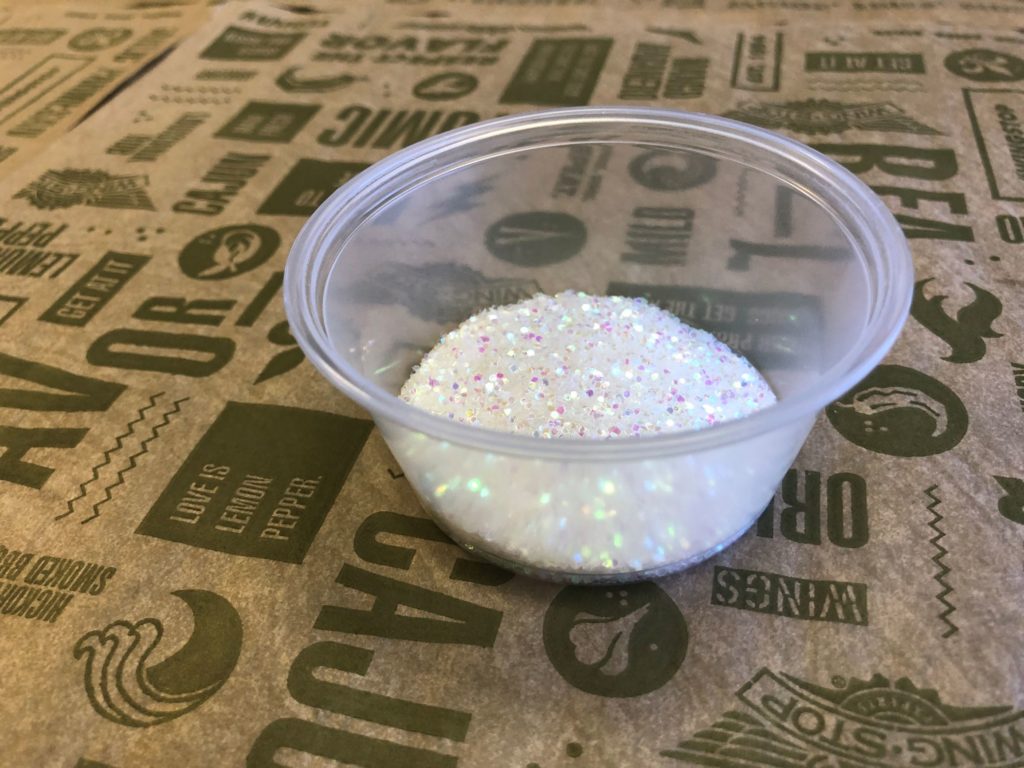 Step 2: Pour glitter into Wingstop ranch cup (as much as desired).