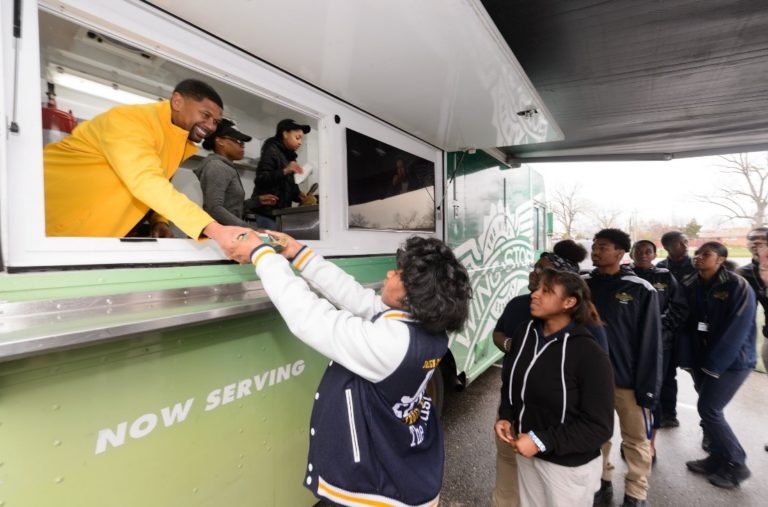 Students proudly yelled their GPA prior to receiving wings served up by an ecstatic Jalen Rose.
